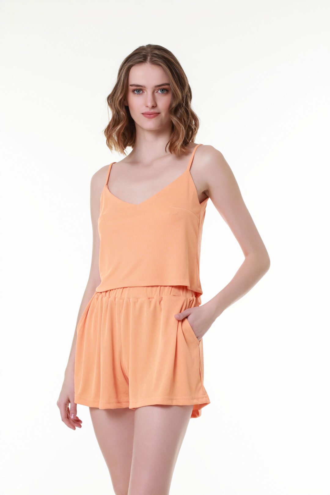 Woman wearing ribbed spaghetti strap tank top – lightweight summer loungewear